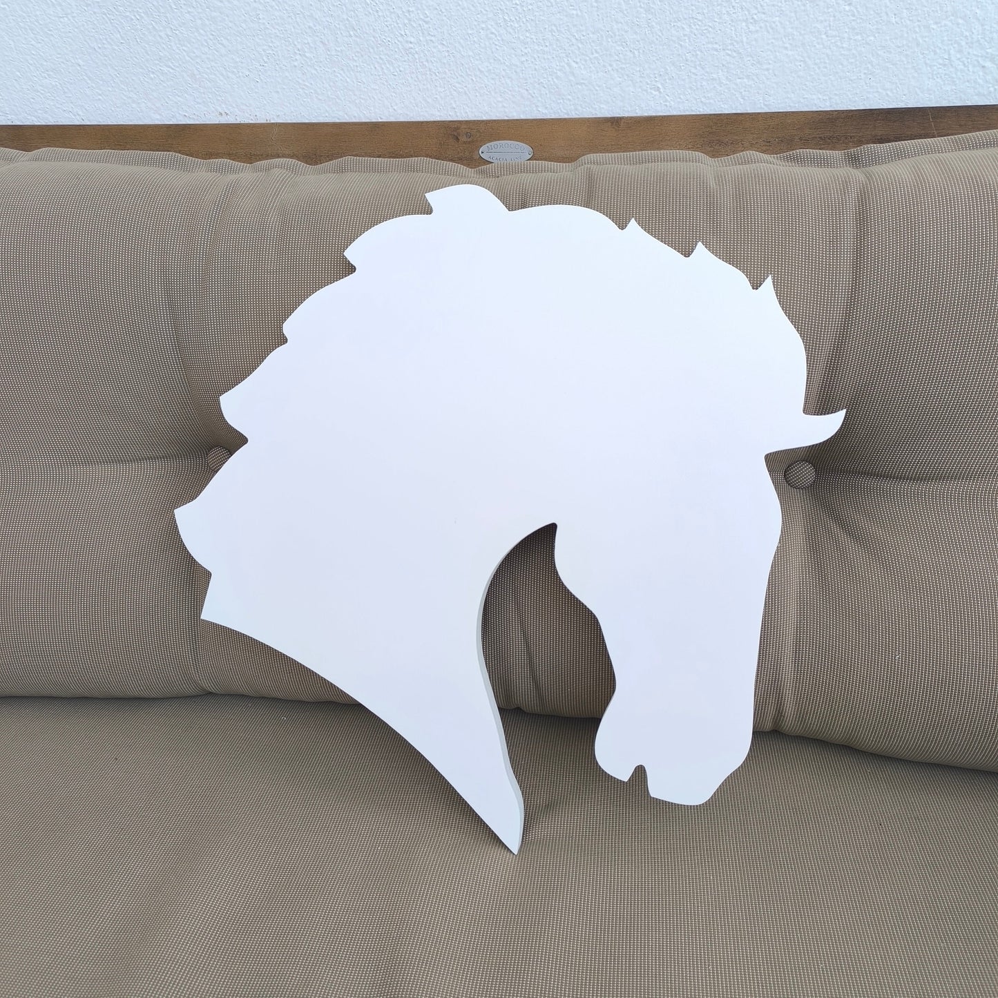 Estatueta de cavalo com fotografias